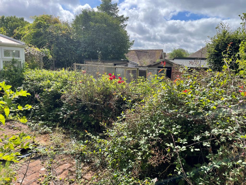 Lot: 69 - CHARACTER COTTAGE IN NEED OF UPDATING AND REPAIR - Patio area to rear of property